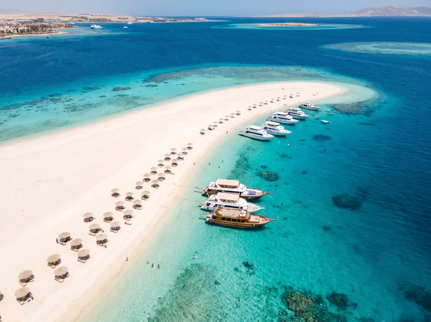 Orange Bay · drone, midday turquoise